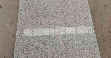 锦州芝麻白光面毛板